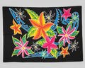 Paréo Lambahoany – Fleurs colorées, fond noir | Tissu malgache 100% coton