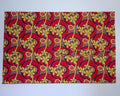 Paréo Lambahoany – Fleurs jaunes, fond rouge | Tissu malgache 100% coton